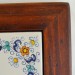 OROLOGIO “VOLUTE FIORI” CON CORNICE TARLATA  DA CM. 28,5